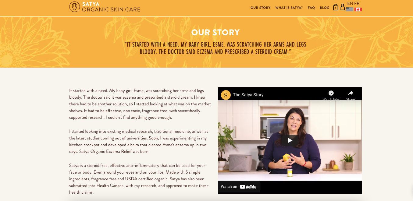 The Satya Homepage, featuring an orange-yellow header, text detailing "Our Story" and a video embedded. 