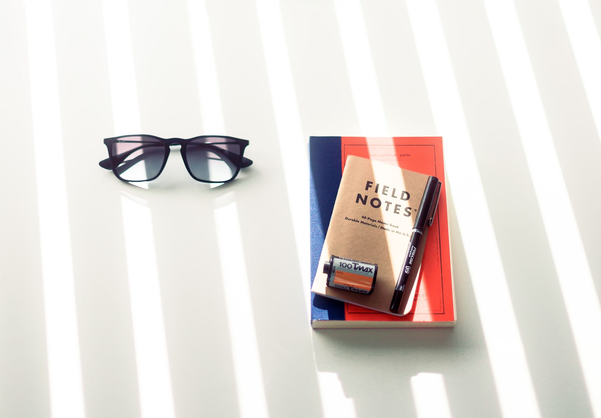 Sunglasses and note books