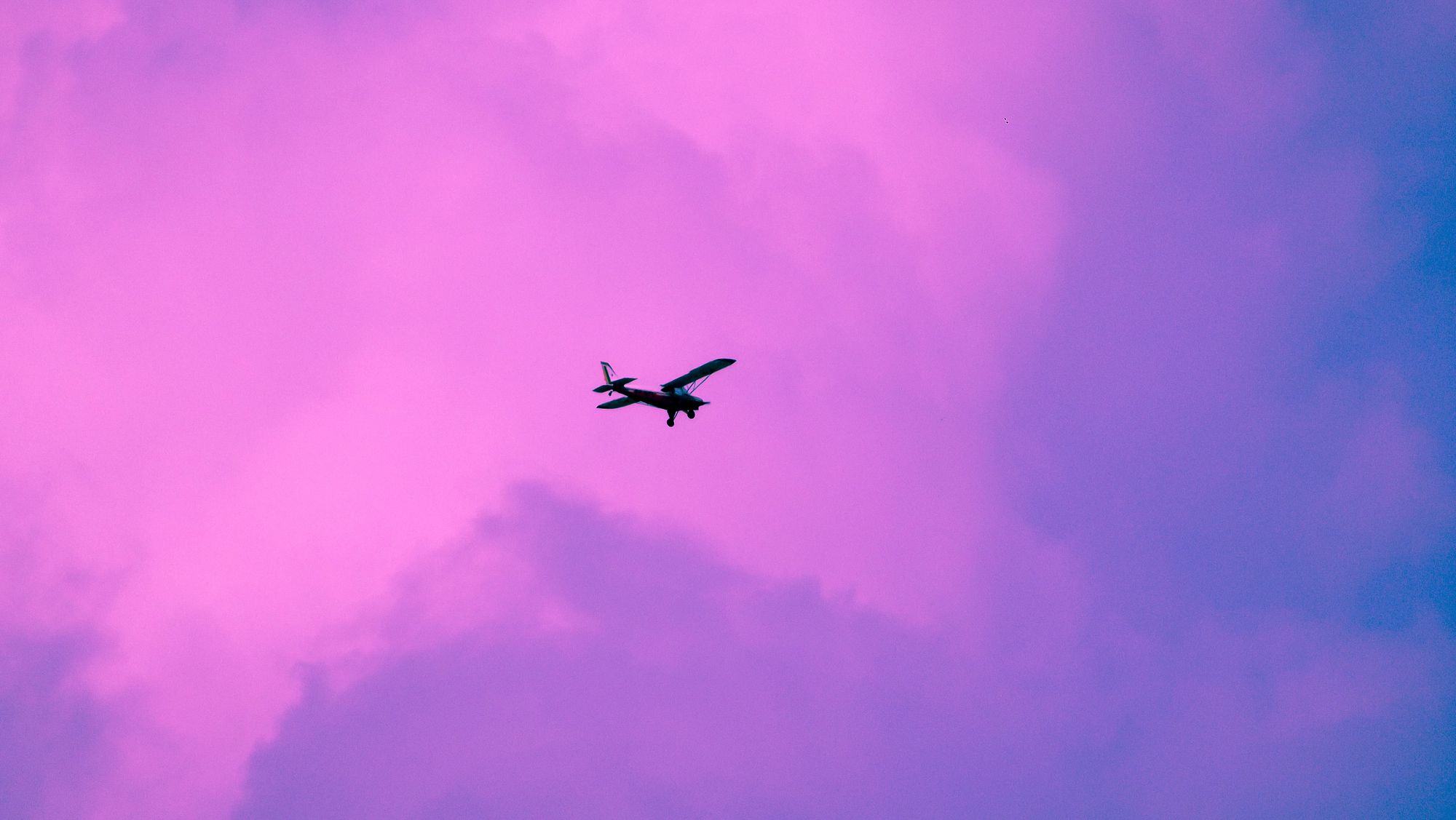 Plane and pink clouds, Buffer