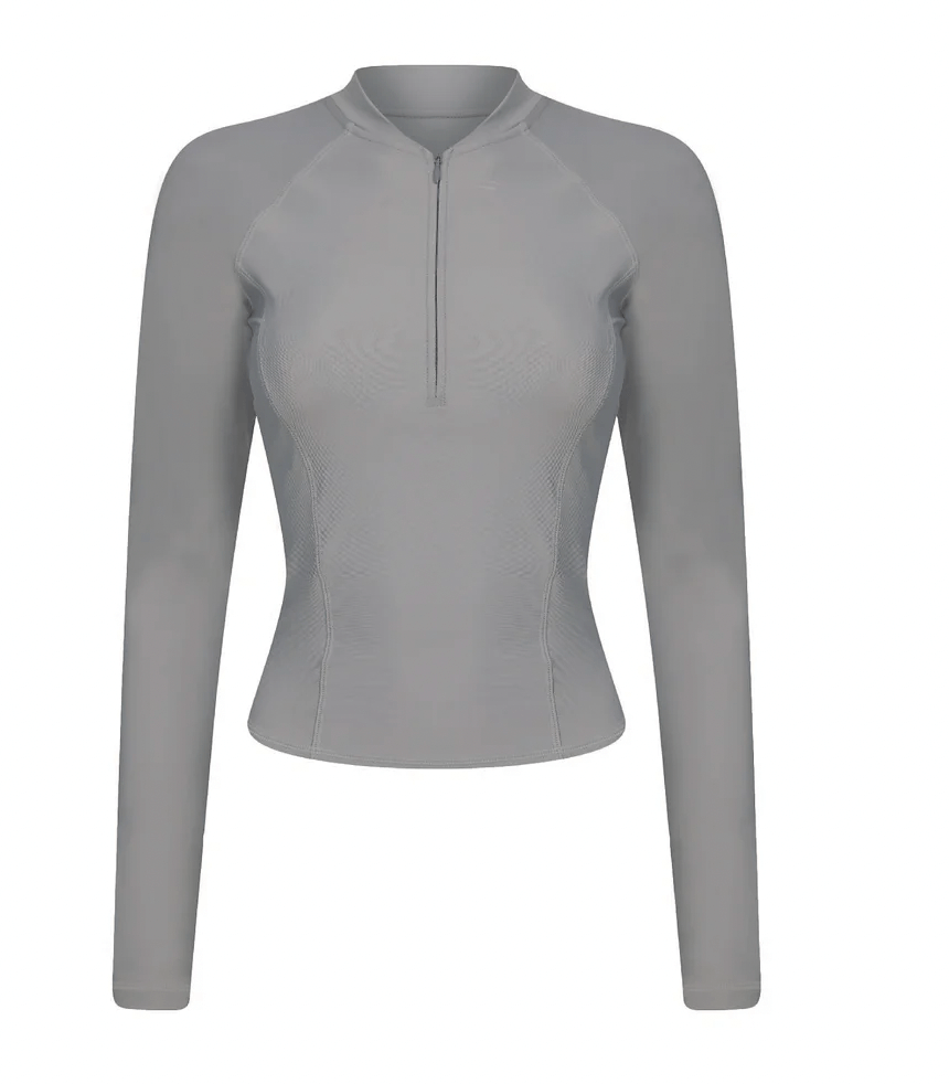 a grey long sleeve athletic top