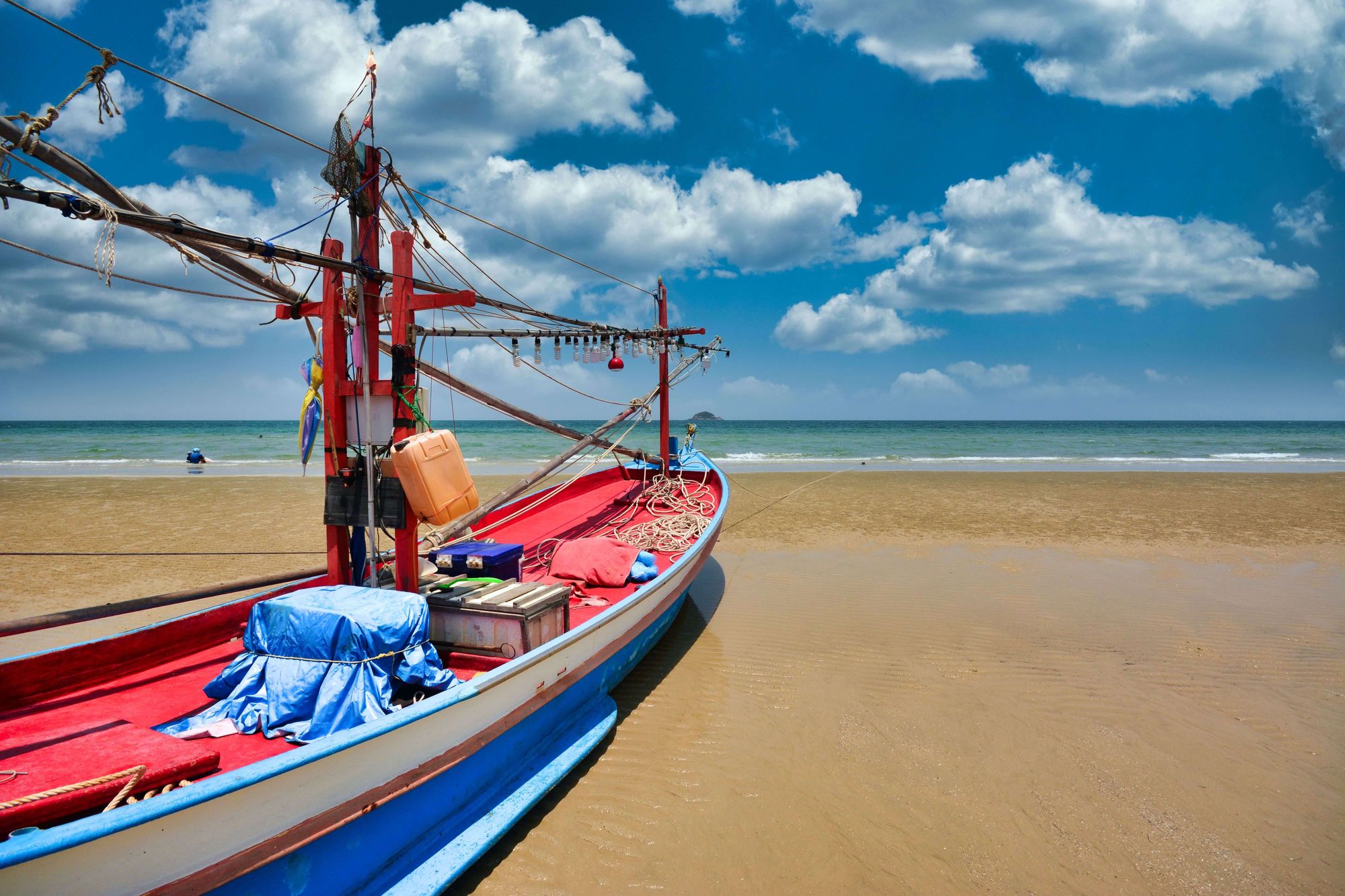 A ship stationed on a Thai beach