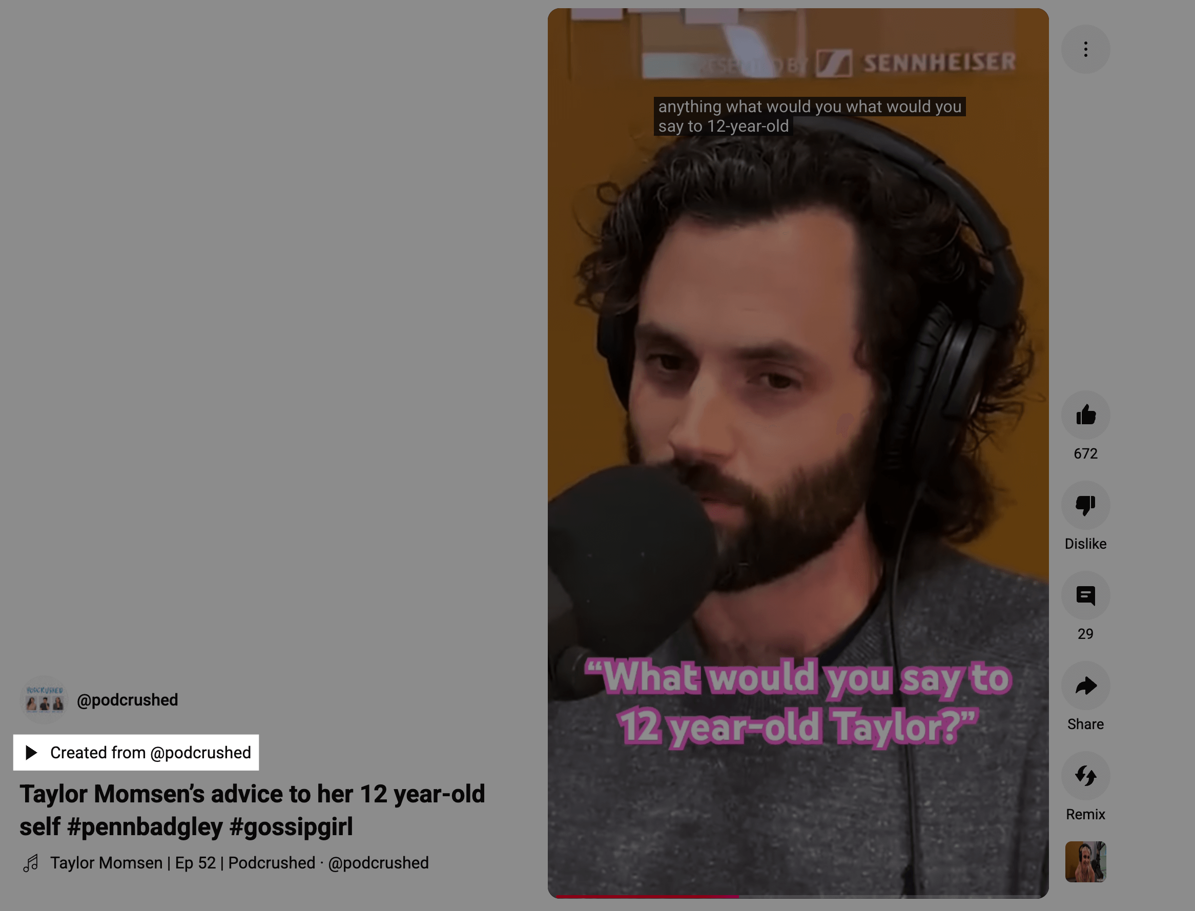 Here’s alt text under 190 characters for this image: Penn Badgley speaks into a mic during a podcast. On-screen text reads: “What would you say to 12 year-old Taylor?” He wears large headphones and a dark sweater.