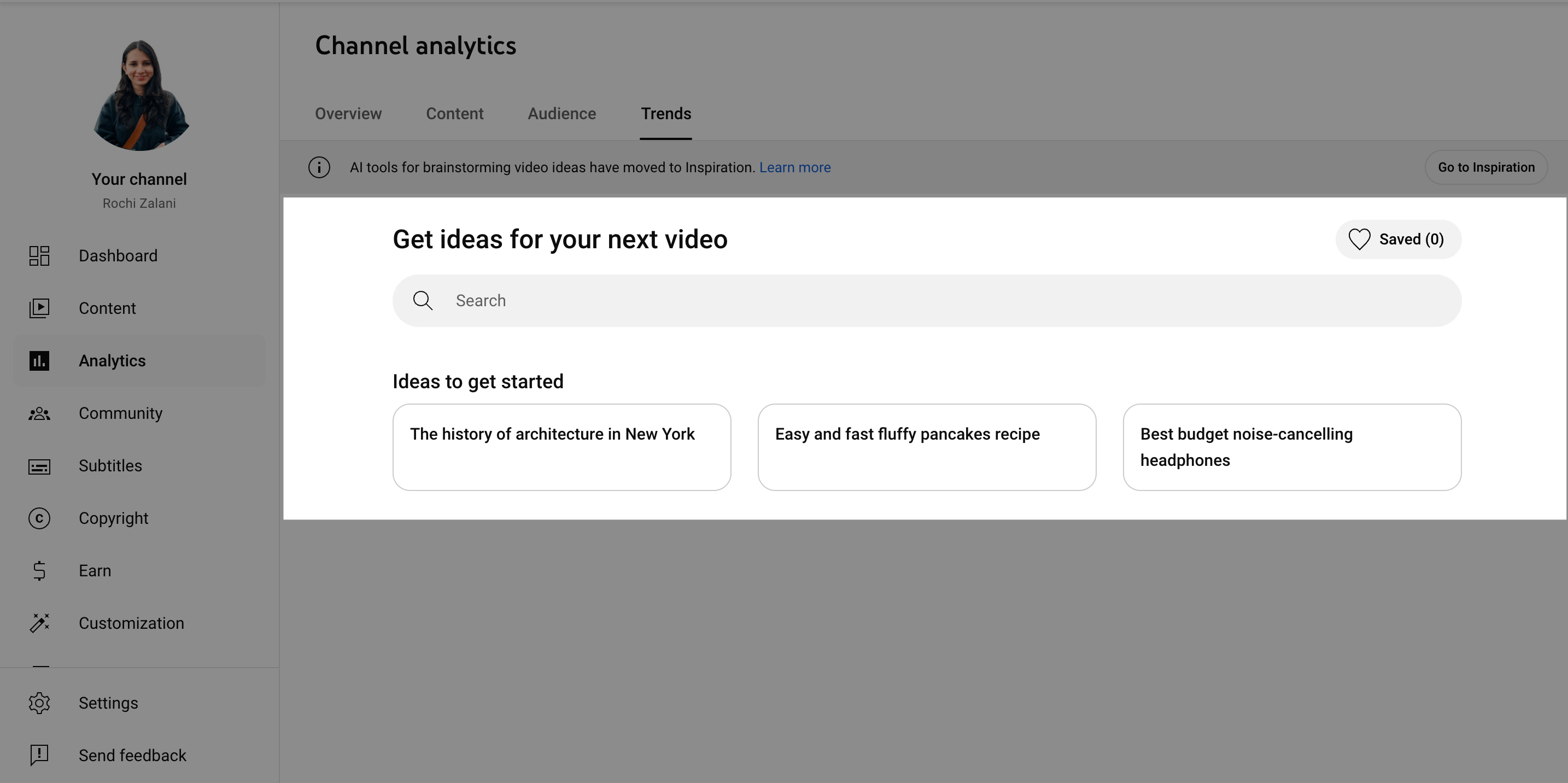 Here’s alt text under 190 characters for the new image: YouTube Studio Video Ideas Panel YouTube Studio Trends tab suggesting video ideas including architecture in New York, fluffy pancake recipes, and budget noise-cancelling headphones.
