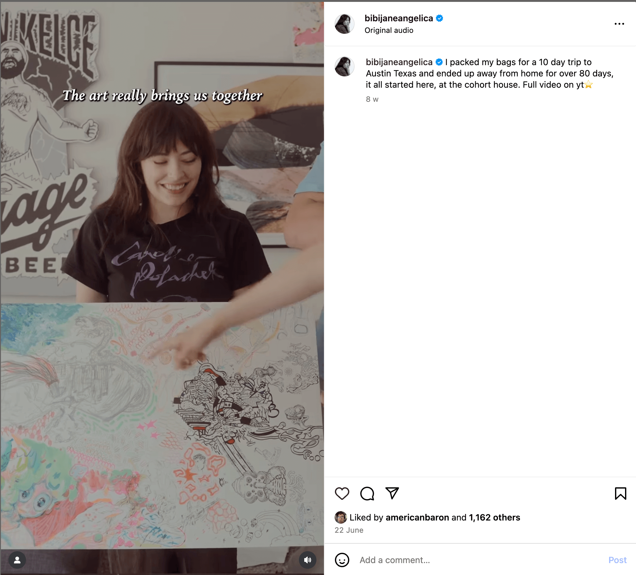Here’s alt text under 190 characters for the image: A smiling woman holds a large collaborative artwork while someone points at it. Text overlay reads “The art really brings us together.” Walls behind feature posters and art.