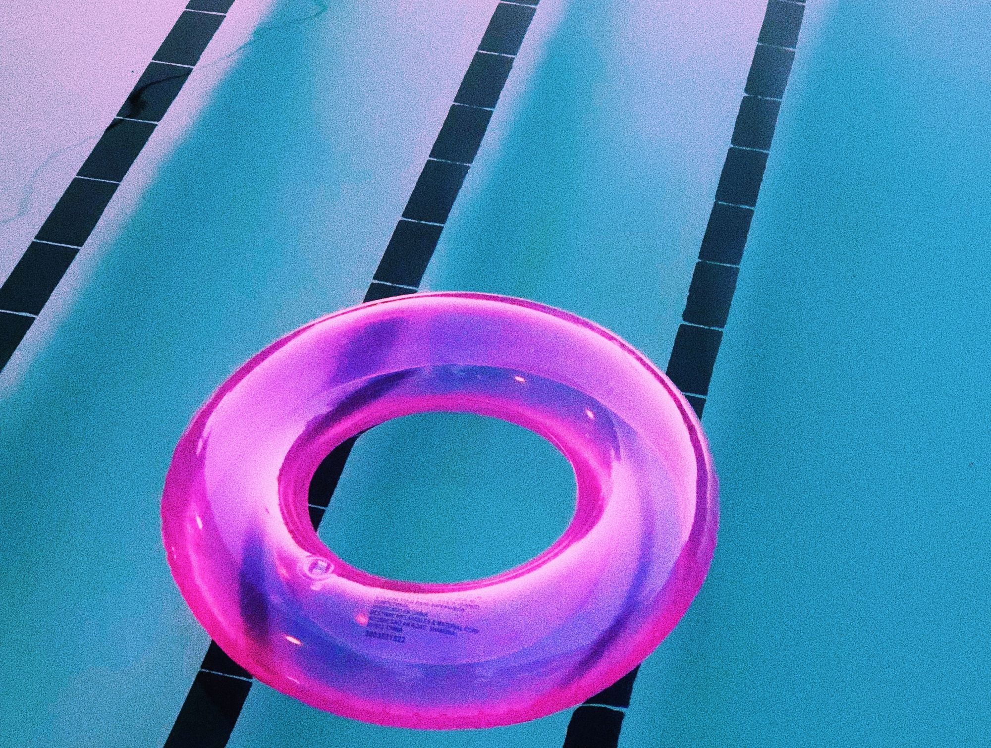 An inflatable pool donut in a pool 