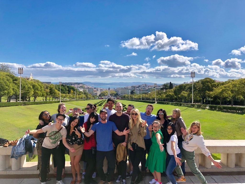 A group of Buffer teammates pose for a photo outside